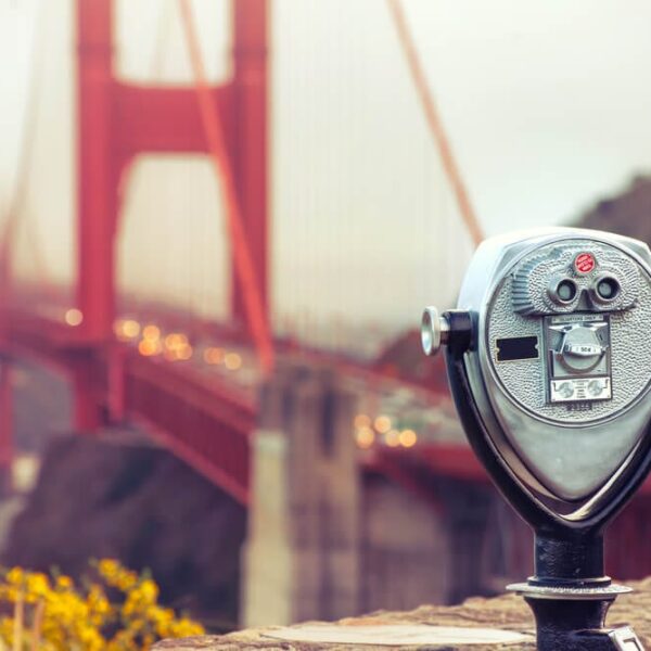 Binoculars in front of the golden gate bridge in san francisco, california.