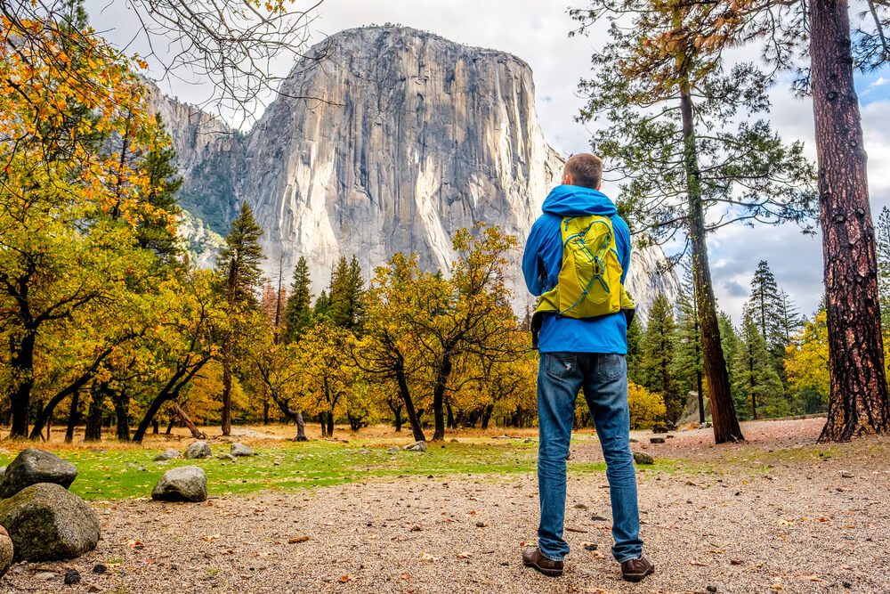 Photo of a person enjoying the views on a Yosemite guided hikes.