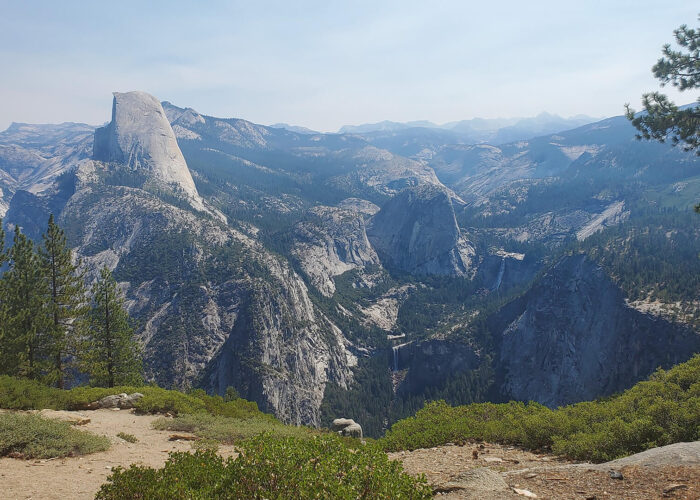 A breathtaking view of Yosemite National Park from the top of a mountain.