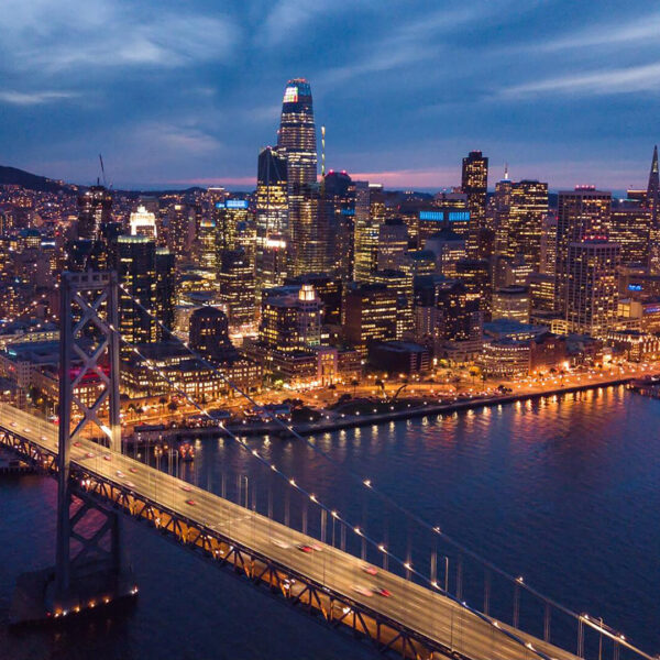 Aerial Cityscape view of San Francisco and the Bay Bridge at Night, California, USA