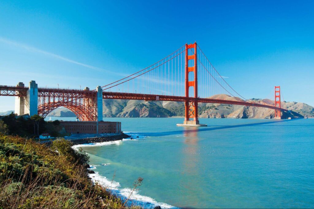 The Golden Gate Bridge in San Francisco with beautiful blue ocean in background