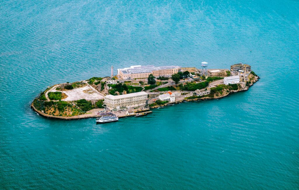 Aerial view of Alcatraz Island showing historic buildings and surrounding waters during the San Francisco Bay Sailing Tour.
