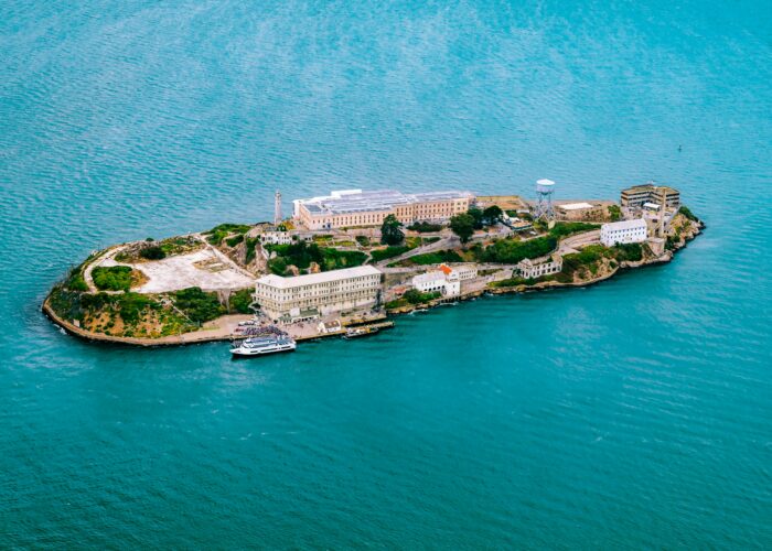 Aerial view of Alcatraz Island showing historic buildings and surrounding waters during the San Francisco Bay Sailing Tour.