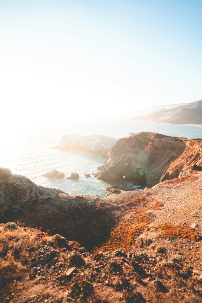 A rocky cliff overlooking the ocean in San Francisco, California.